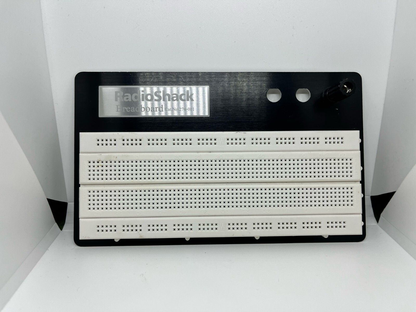 Solderless Universal Breadboard, Radioshack. Tested, no issues. Large size.