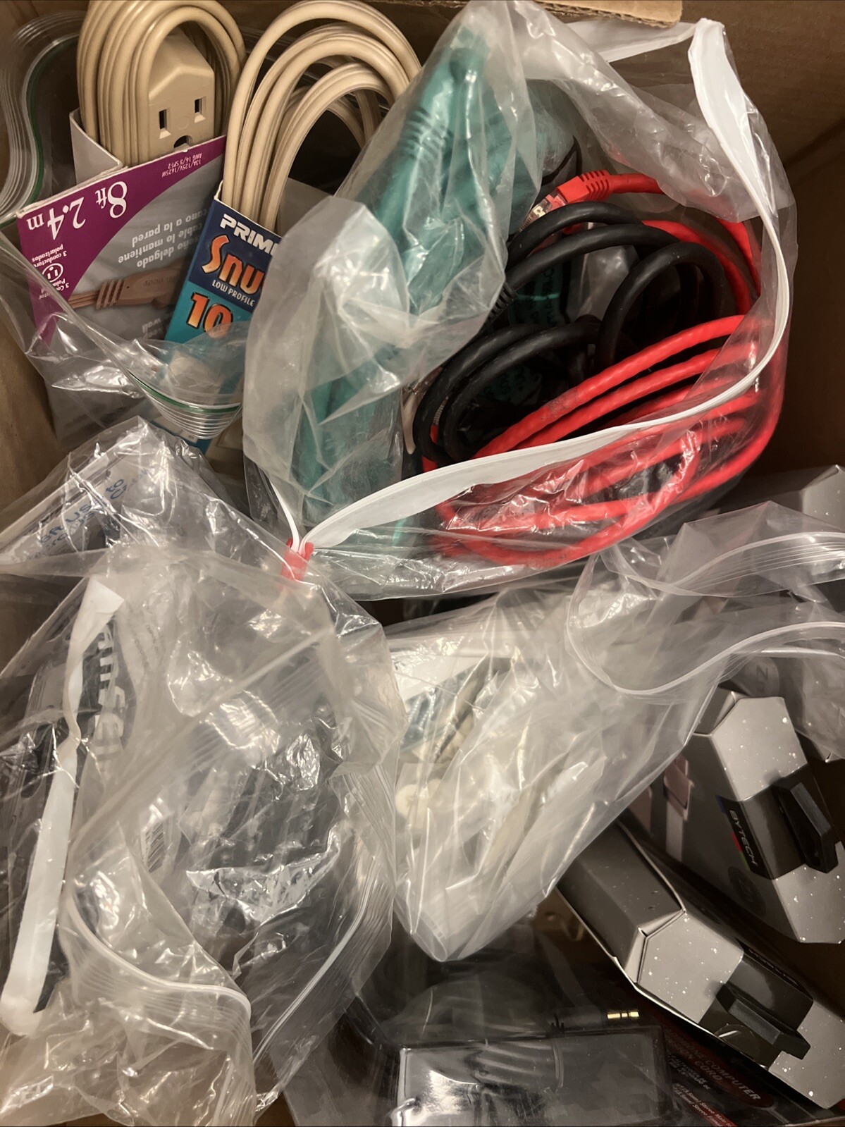 Magic Box Of USB, Ethernet, Cat-6, Extension Cords, And Drywall Anchor Kits